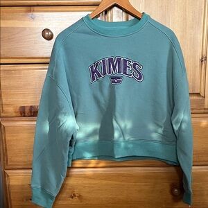 Kimes Ranch Green Sweatshirt with Purple Logo